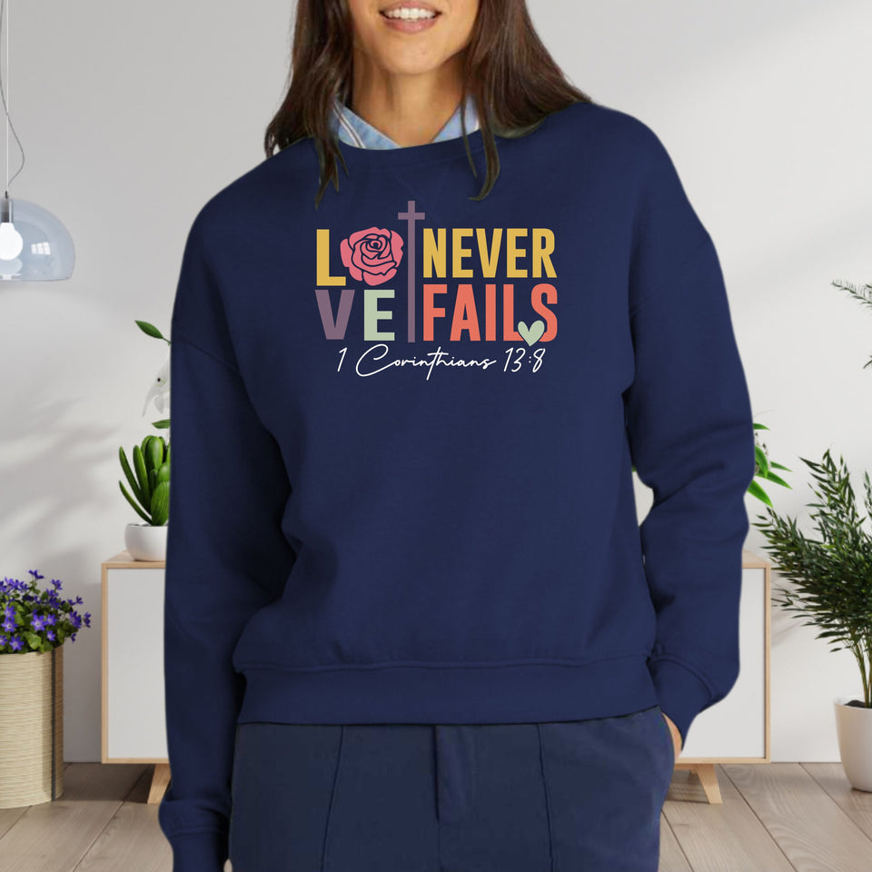 Love Never Fails Women's Fleece Crewneck Sweatshirt